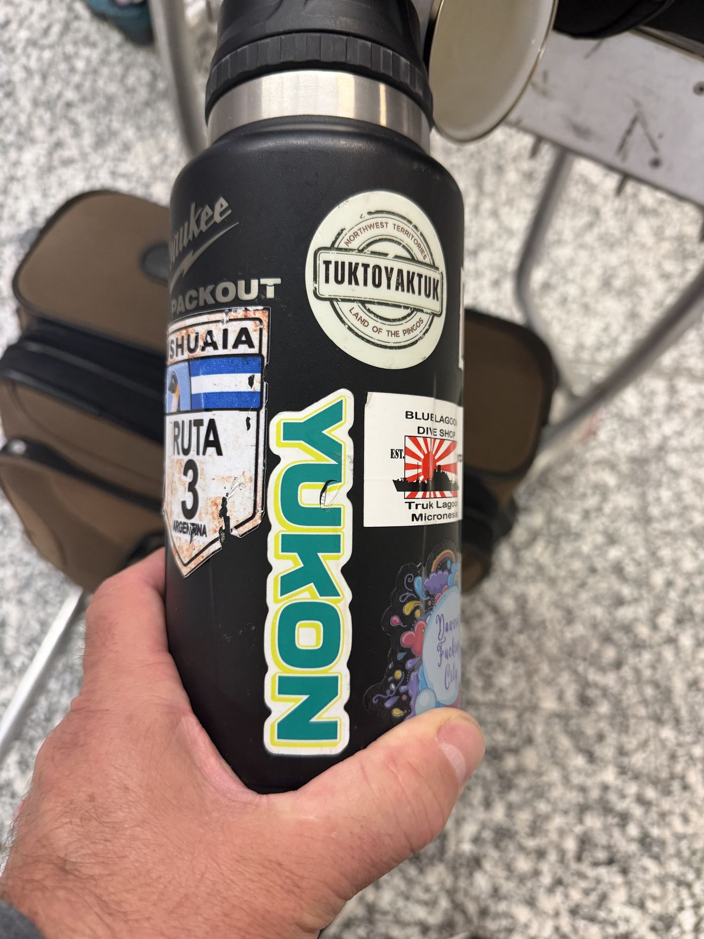 A sticker-covered water bottle